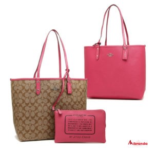 Shopping bag City,de Coach, reversible estampado kaki-liso pink