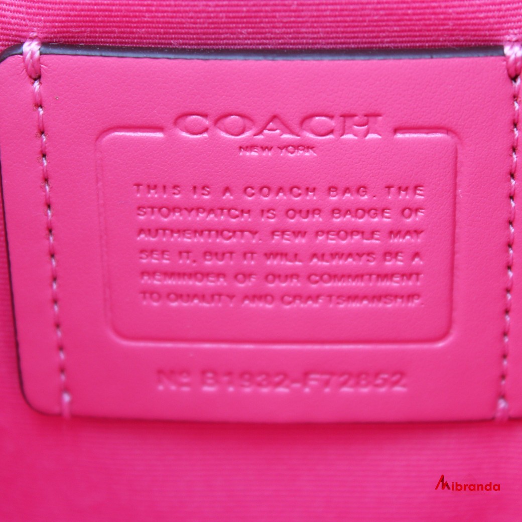 Bolso de hombro, de Coach, modelo Paxton, estampado y rosa