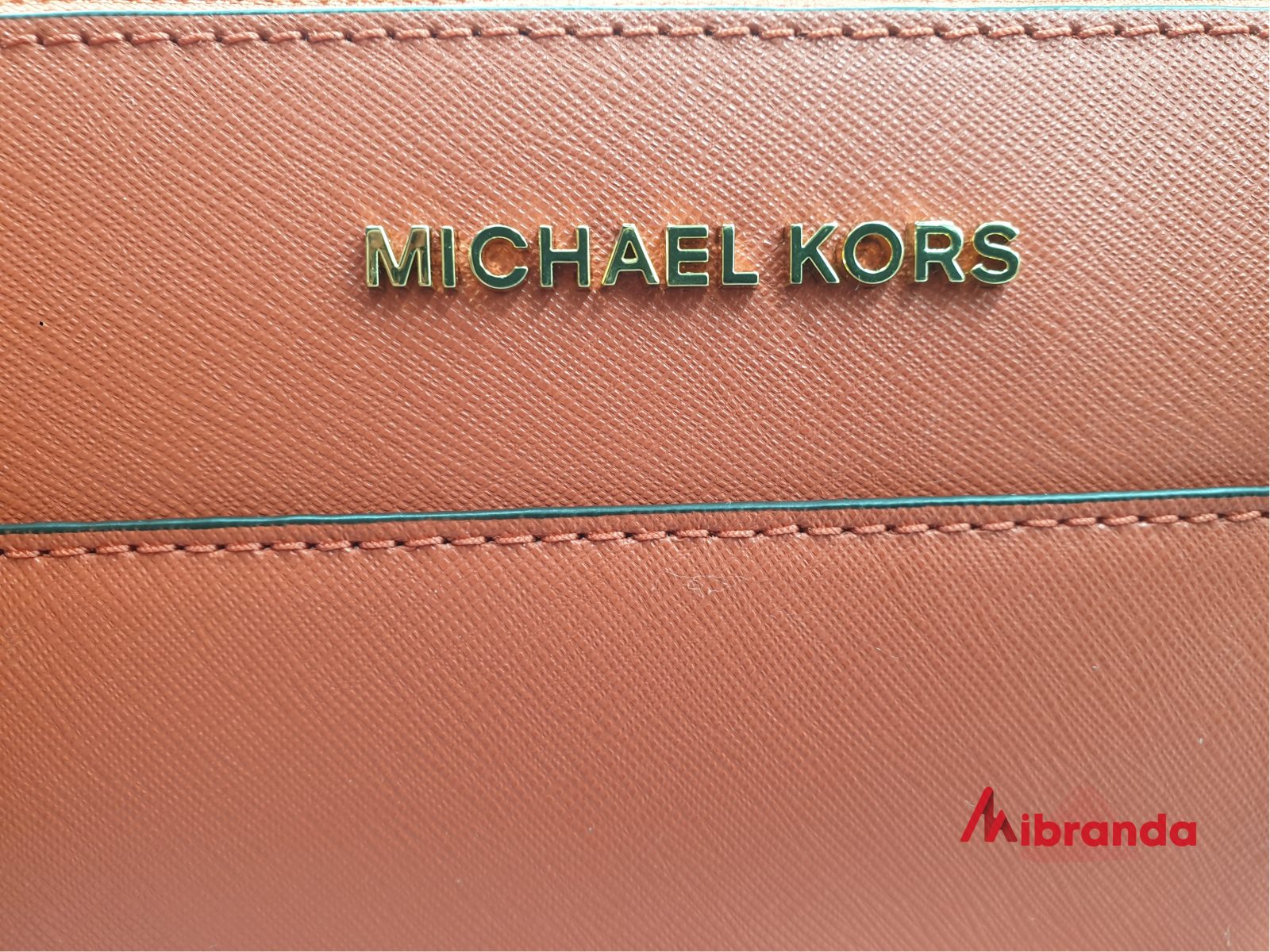 Cómo diferenciar un bolso de Michael Kors verdadero de uno - Mibranda