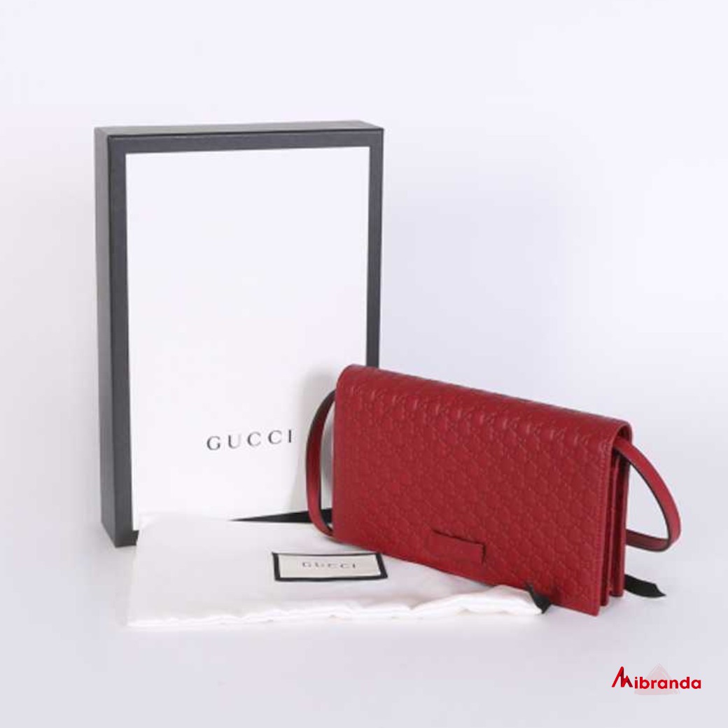 Gucci bolso bandolera GG, rojo oscuro.
