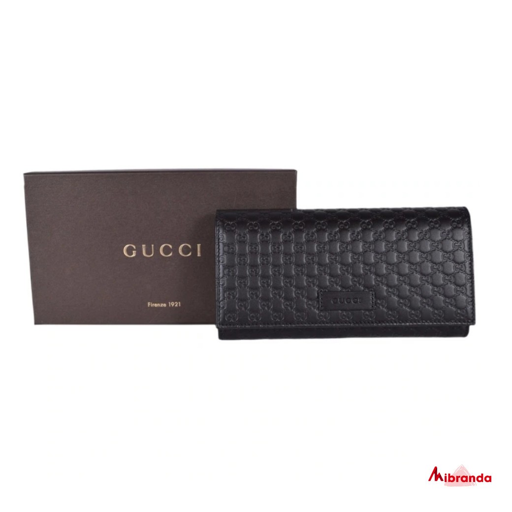 Gucci cartera con solapa GG microguccíssima, piel negra.