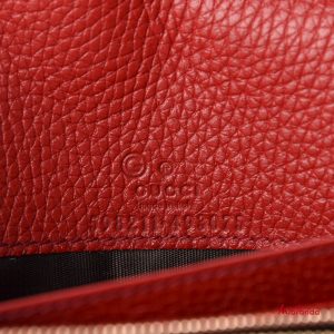 Cartera-bolso bandolera Soho con cadena, rojo, de Gucci.
