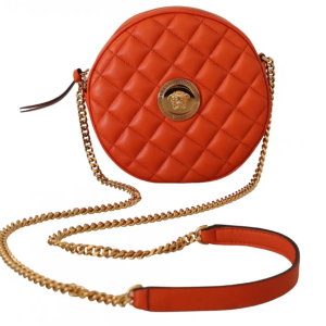 Bolso bandolera redonda, naranja, con medusa, de Versace.