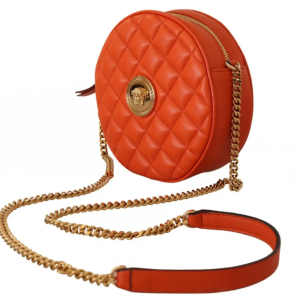 Bolso bandolera redonda, naranja, con medusa, de Versace.